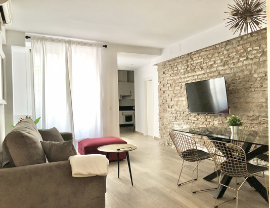 Disfruta de los mejores apartamentos vacacionales en Málaga. Visita Suites La Merced 2 dormitorios Bajo